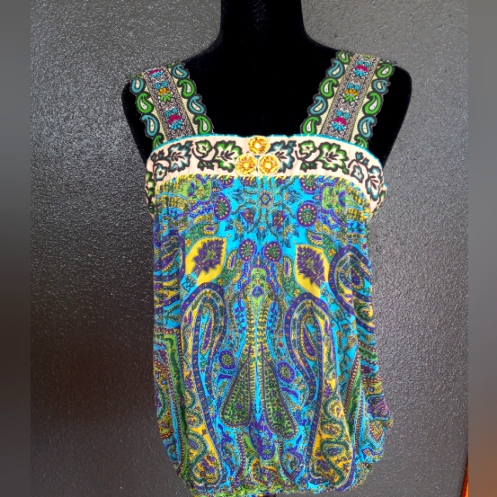 Free People wide strap embroidered tank size L. Blue and multi color embroidery